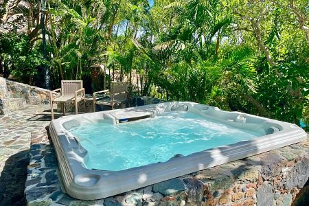 Stone path to hot tub and beach