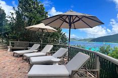 Lounge chairs on the pool patio