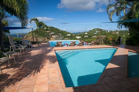 pool and exterior of villa