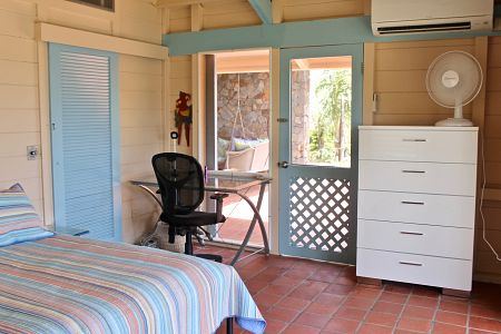 Guest bedroom looking to patio